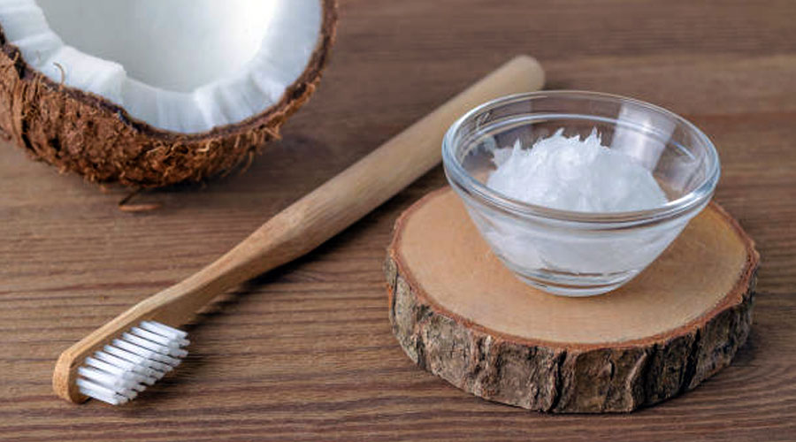 Get Coconut White Teeth With Oil Pulling